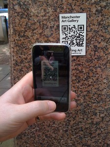 Image of smartphone and QR label